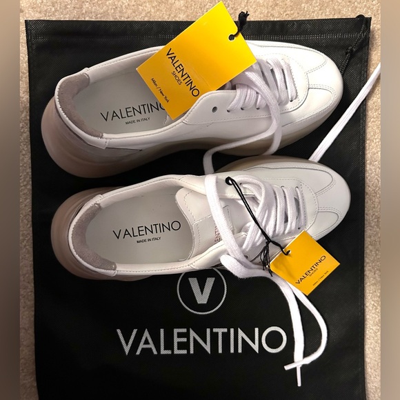 Brand New. Valentino sneakers. Comes with dust bag &...